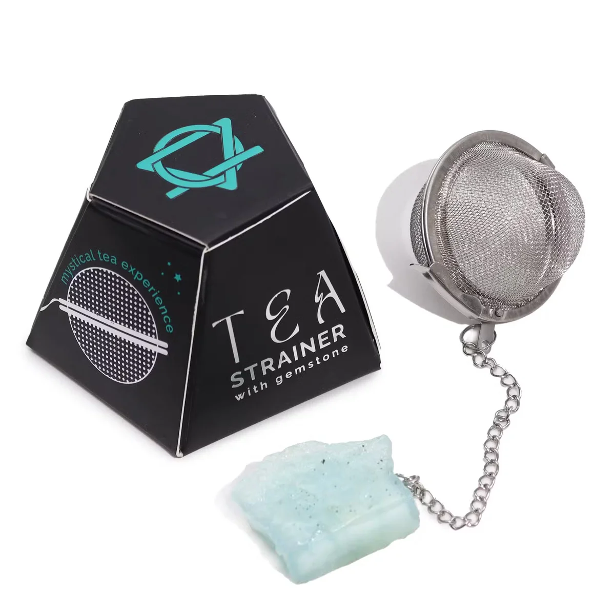 Raw aquamarine crystal tea infuser with metal mesh strainer on white background for loose leaf tea brewing