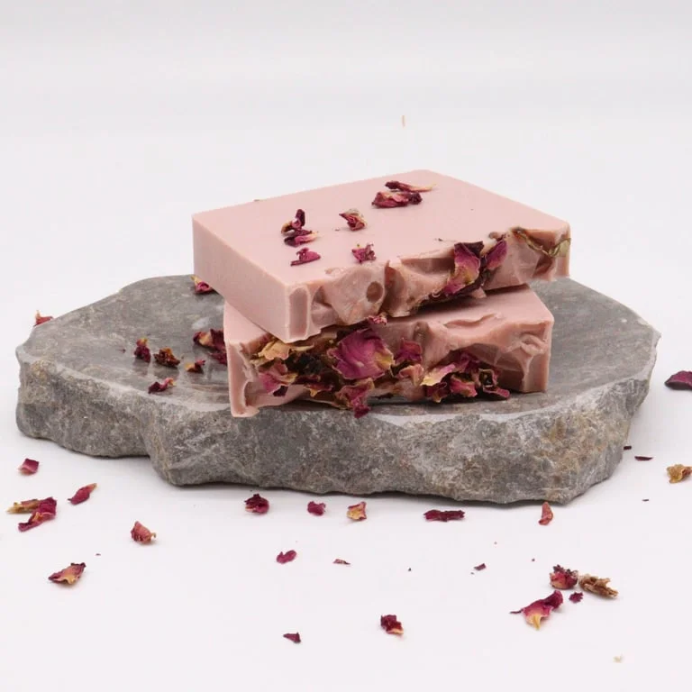 Enchanted rose soap loaf with a soft pink hue and smooth texture, ideal for gentle cleansing and aromatic bath use