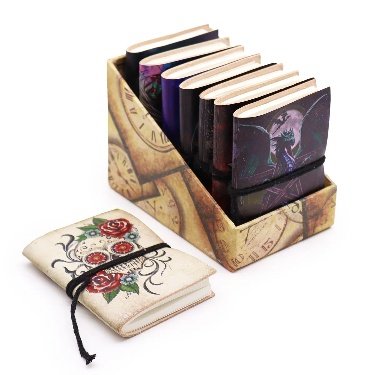 Set of assorted 7x10cm gothic notebooks with dark, ornate cover designs stacked together