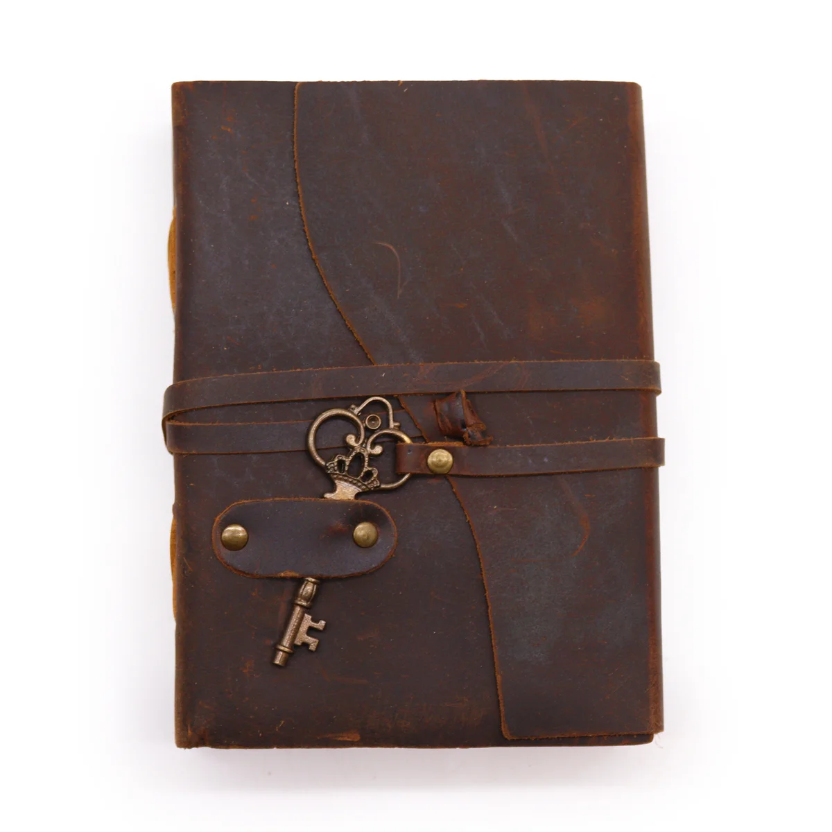 Oiled leather 200 page journal with decle-edged pages, measuring 13x18cm, shown closed with a key accessory