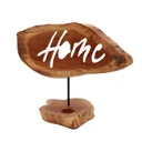 Decorative candle holder sign with a simple home‑themed design.