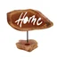 Candle holder sign hanging on a wall, featuring a simple metal holder and clean lettering for home décor.