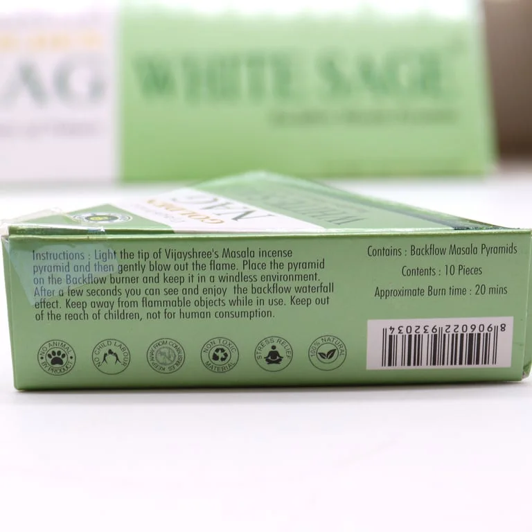 Jumbo 42g Golden Nag white sage backflow incense cones stacked, radiating fragrant aroma.