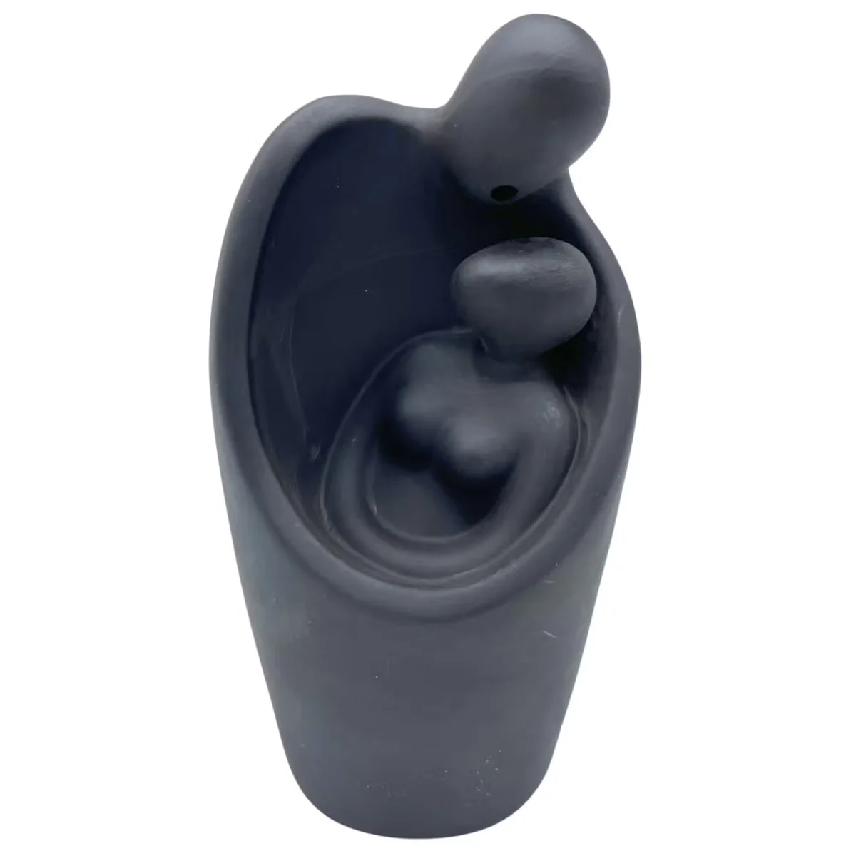 Backflow incense cone burner shaped as two lovers embracing, designed for calming smoke flow effect