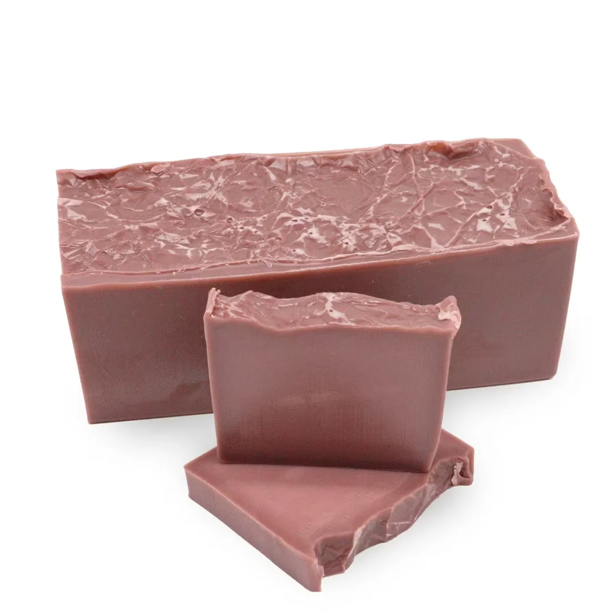 Raspberry Bliss soap loaf with a rich pink color, raspberry scented soap ideal for a refreshing cleanse