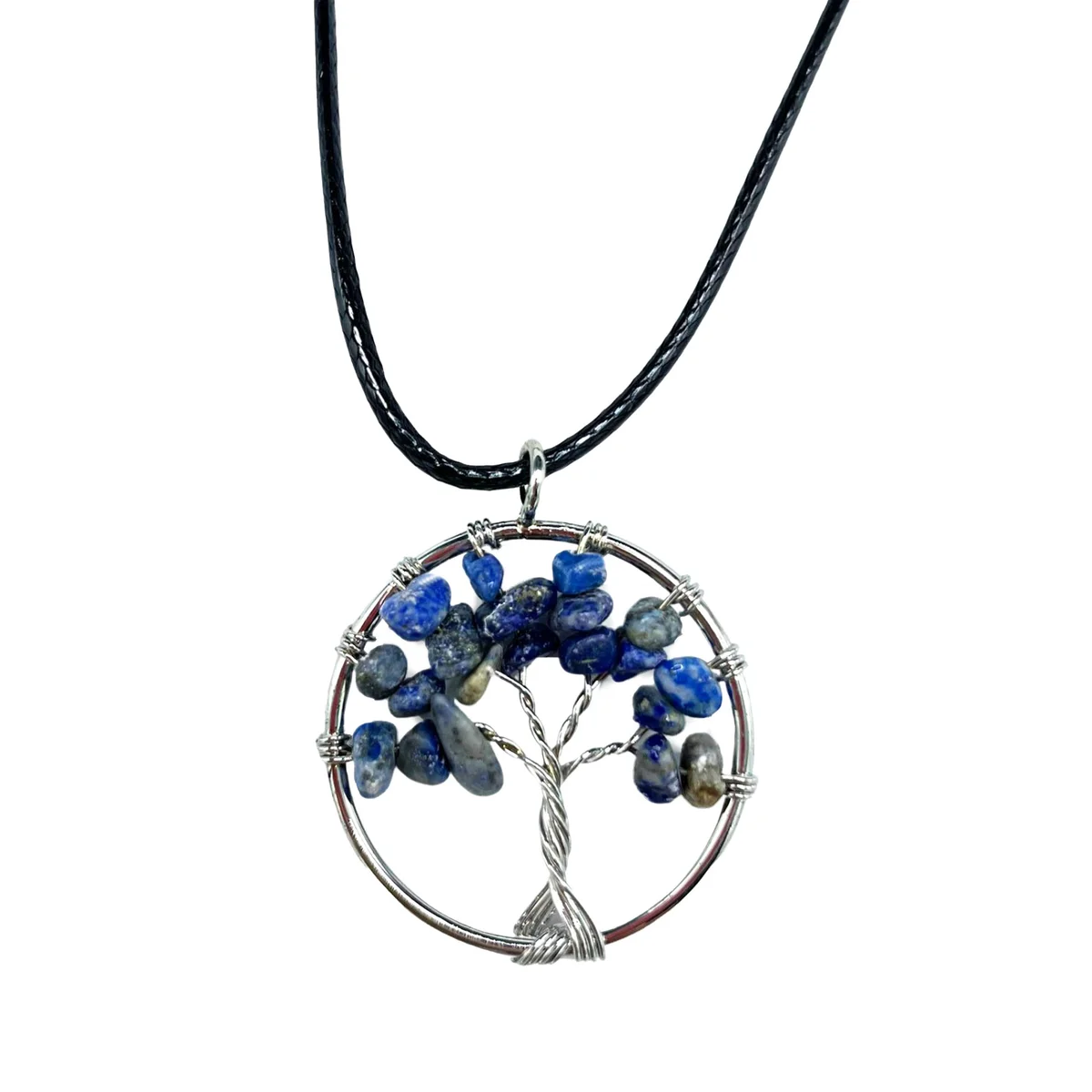 Tree of Life pendant featuring a sodalite stone, worn on a thin chain, styled as spiritual jewellery UK