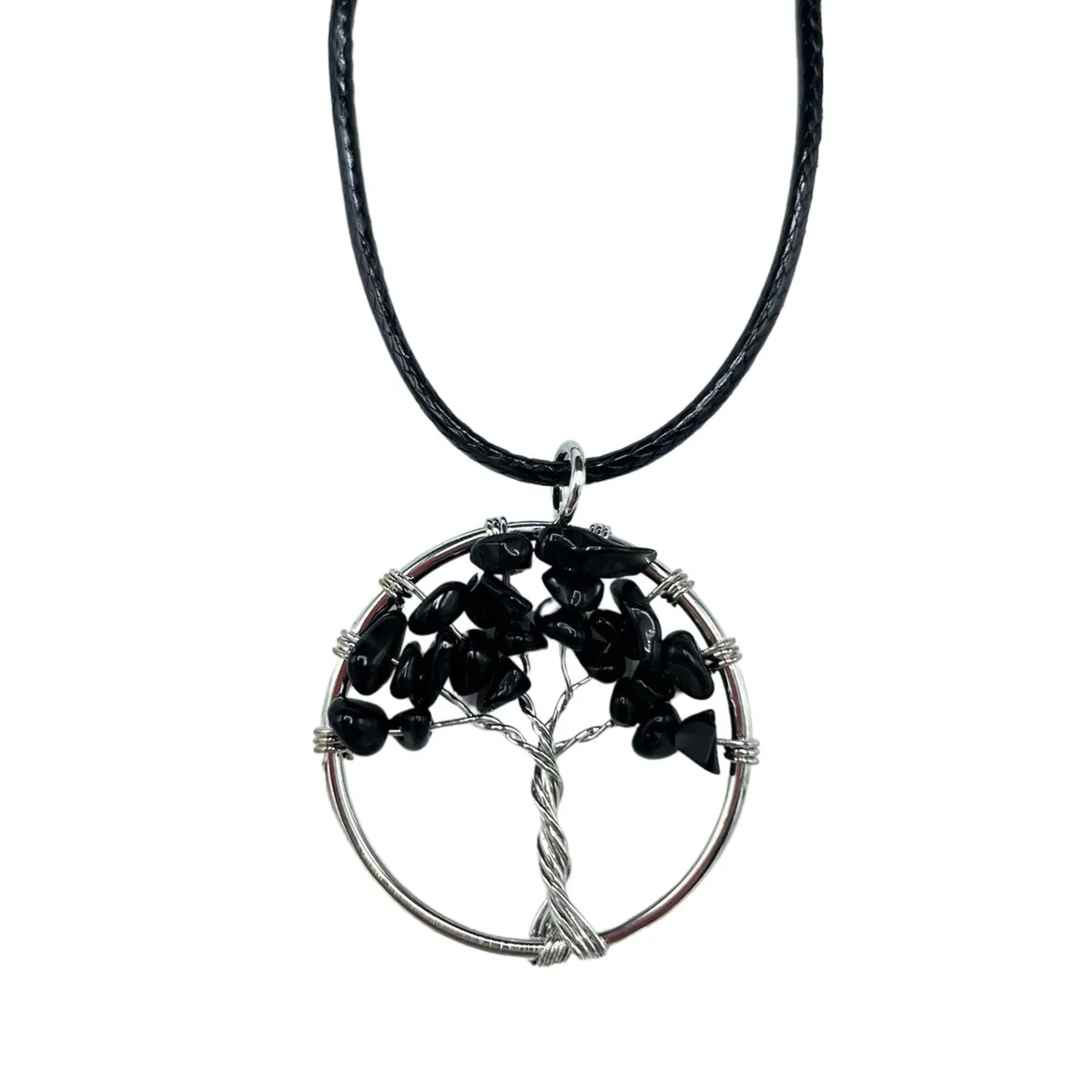 Tree of Life pendant featuring black agate stone on a polished metal setting