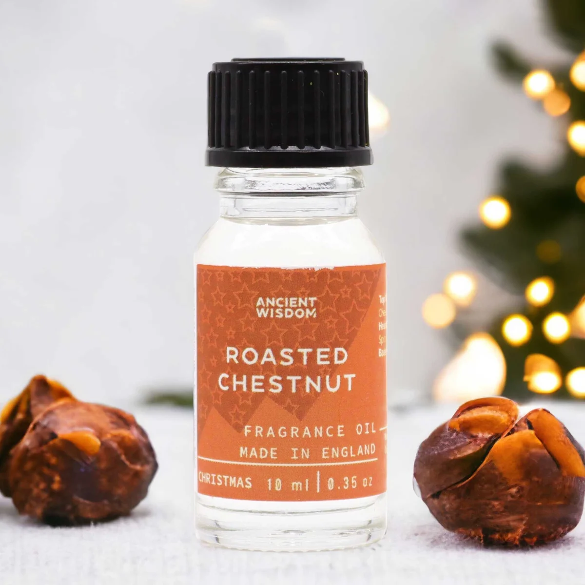 Small 10ml bottle of roasted chestnut fragrance oil with brown label on white background