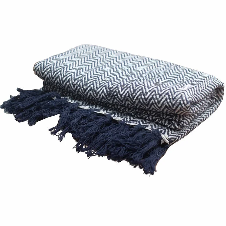 Navy zigzag boho throw blanket displayed folded, showing rich navy pattern.
