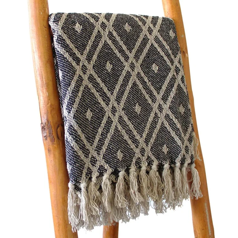 Boho comfort throws in black and beige colours.