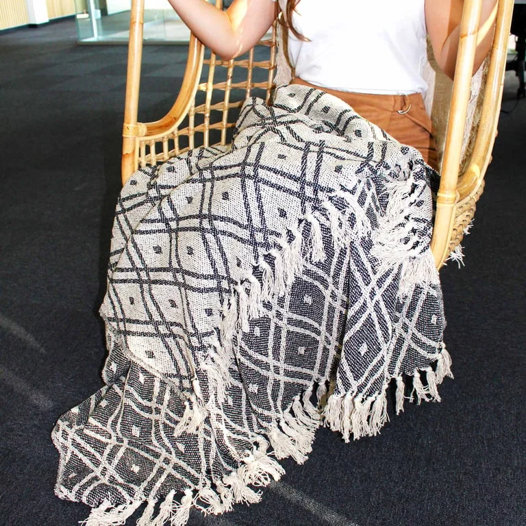 Soft boho blanket in black and beige, representing Boho Comfort Throws – Black & Beige Regency.