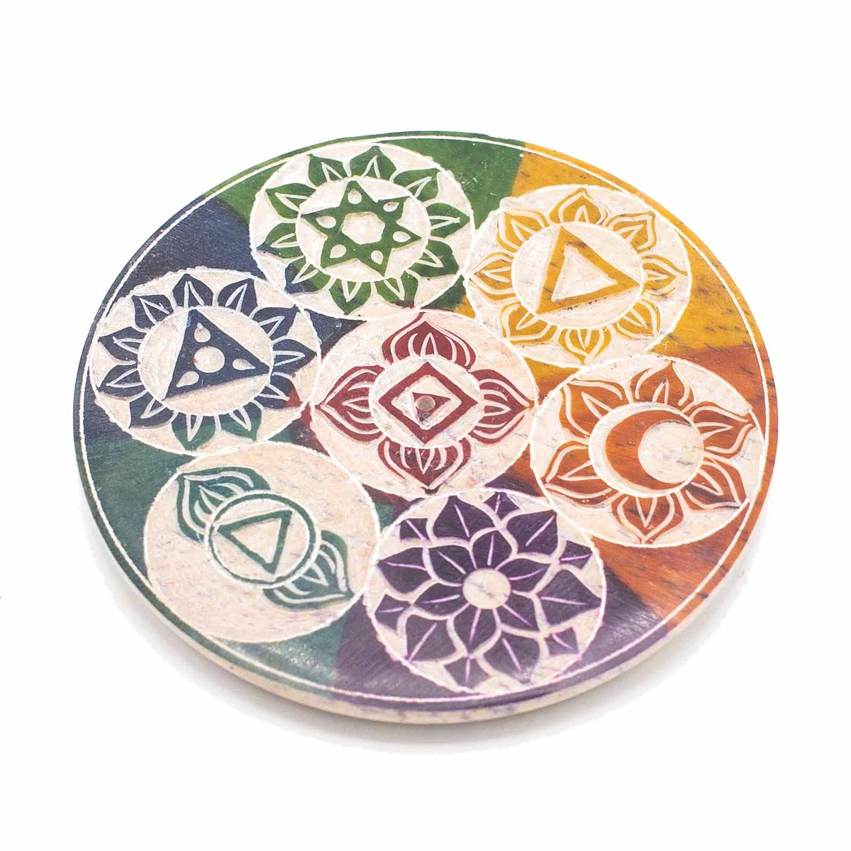 Soapstone incense disc holder with seven‑chakra design, 10cm.