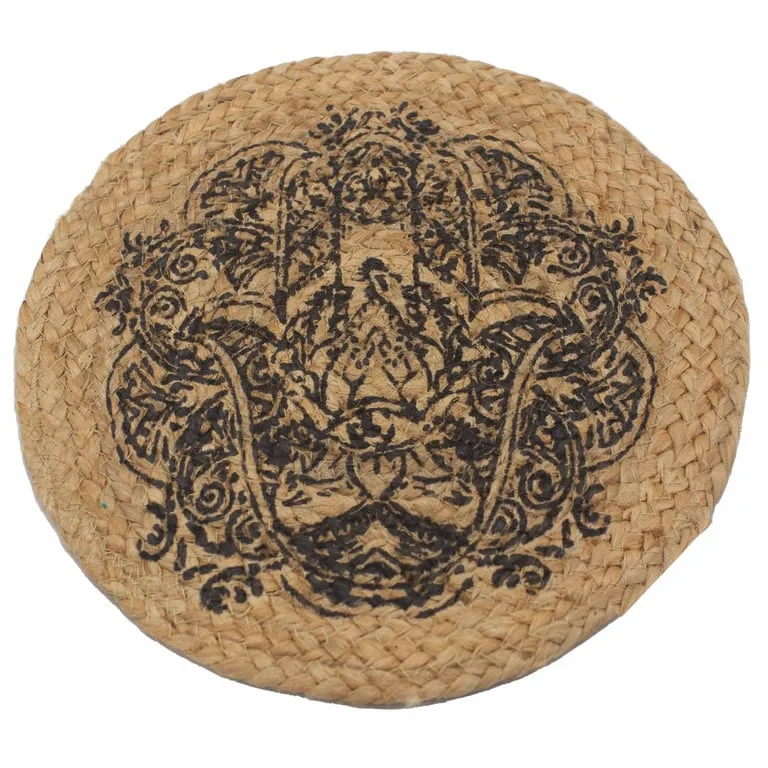Jute place mat with a white hamsa print displayed on a natural wooden tabletop.