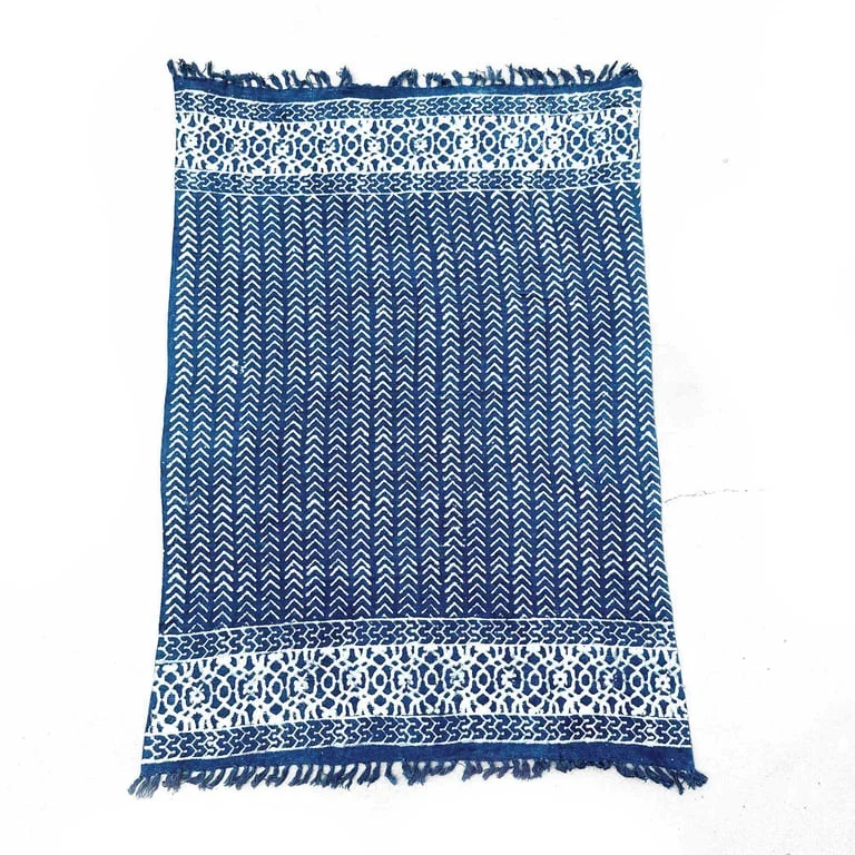 Handmade indigo throw blanket, 170x120cm, deep blue, soft woven texture.