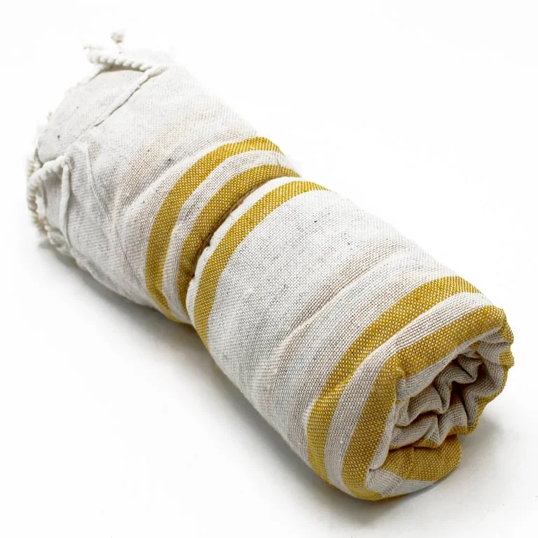 Bright sunrise yellow spa towel measuring 90x170 cm, shown folded on a towel rack.