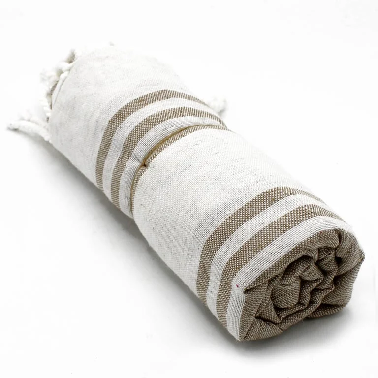 Hamman spa towel in sand colour, 90x170cm, neatly folded.