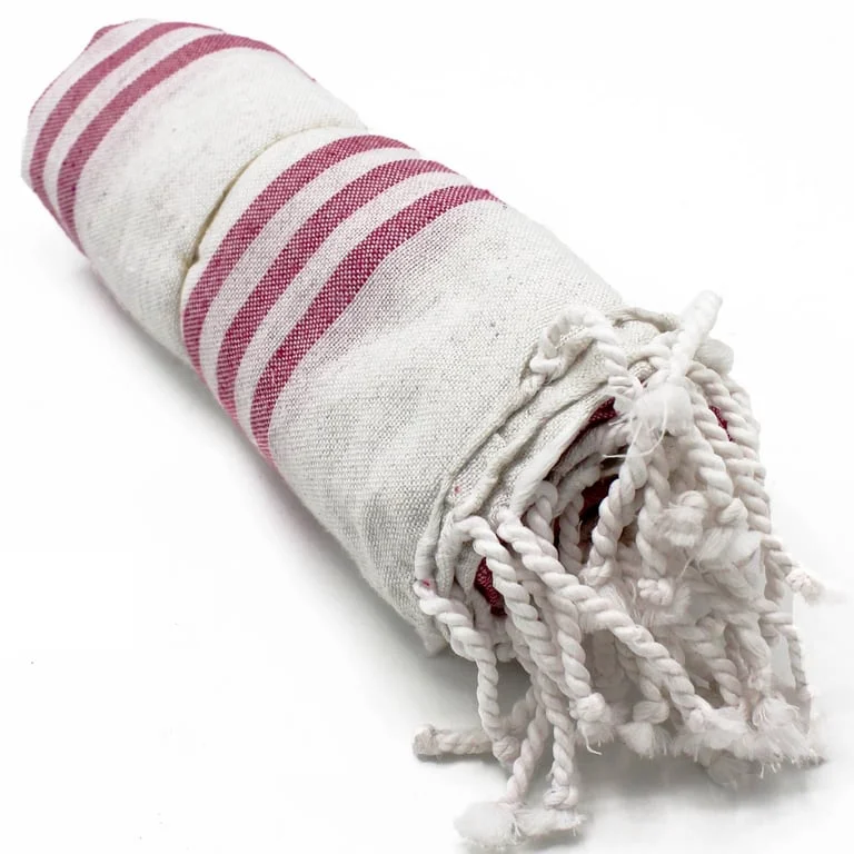 Sunset pink towel measuring 90x170cm, soft fabric rolled for display.