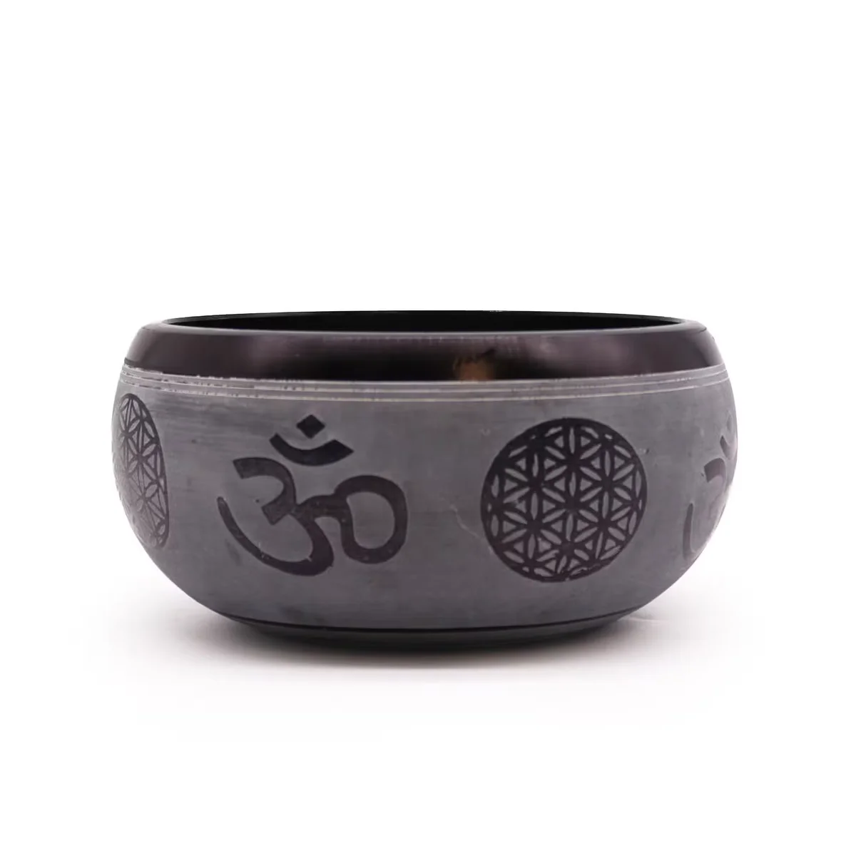 16cm Earth Powder meditation singing bowl engraved with Om Five Buddha design on a wooden surface