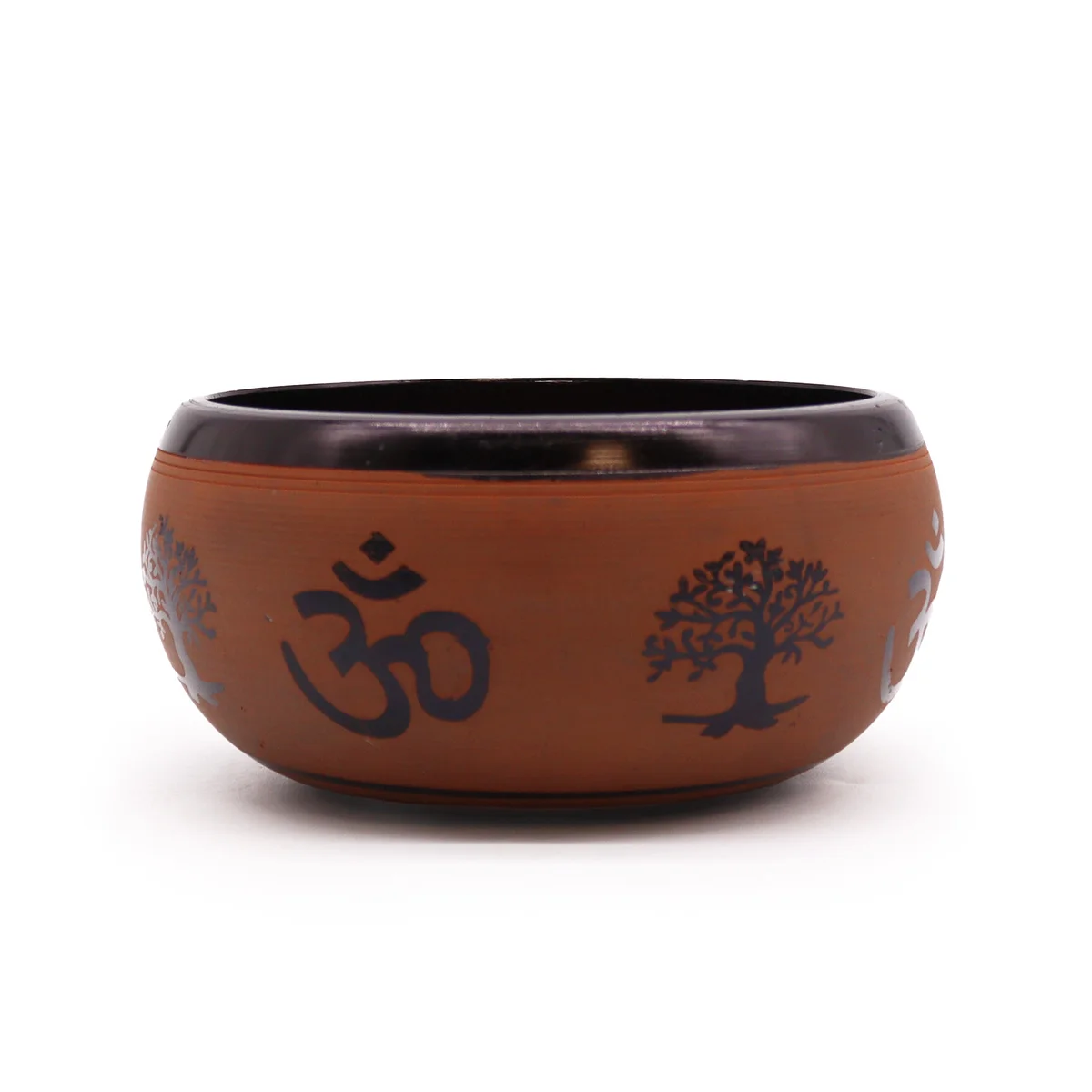 Earth Powder Buddha singing bowl in clay with Om design, 16cm diameter, resting on a wooden surface