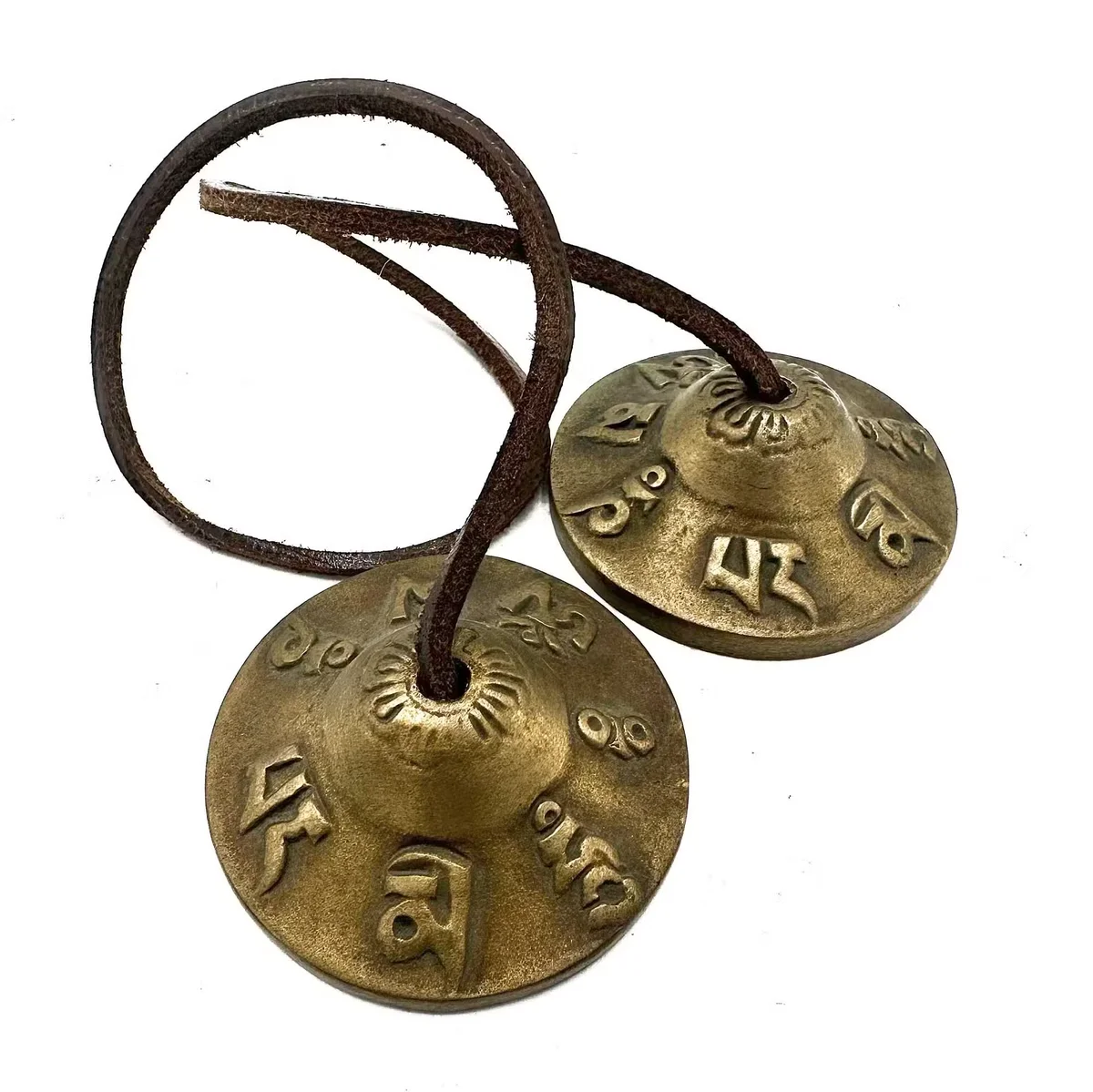 Pair of 6cm tingsha cymbals with Tibetan lucky symbols engraved on the surface, connected by a leather strap