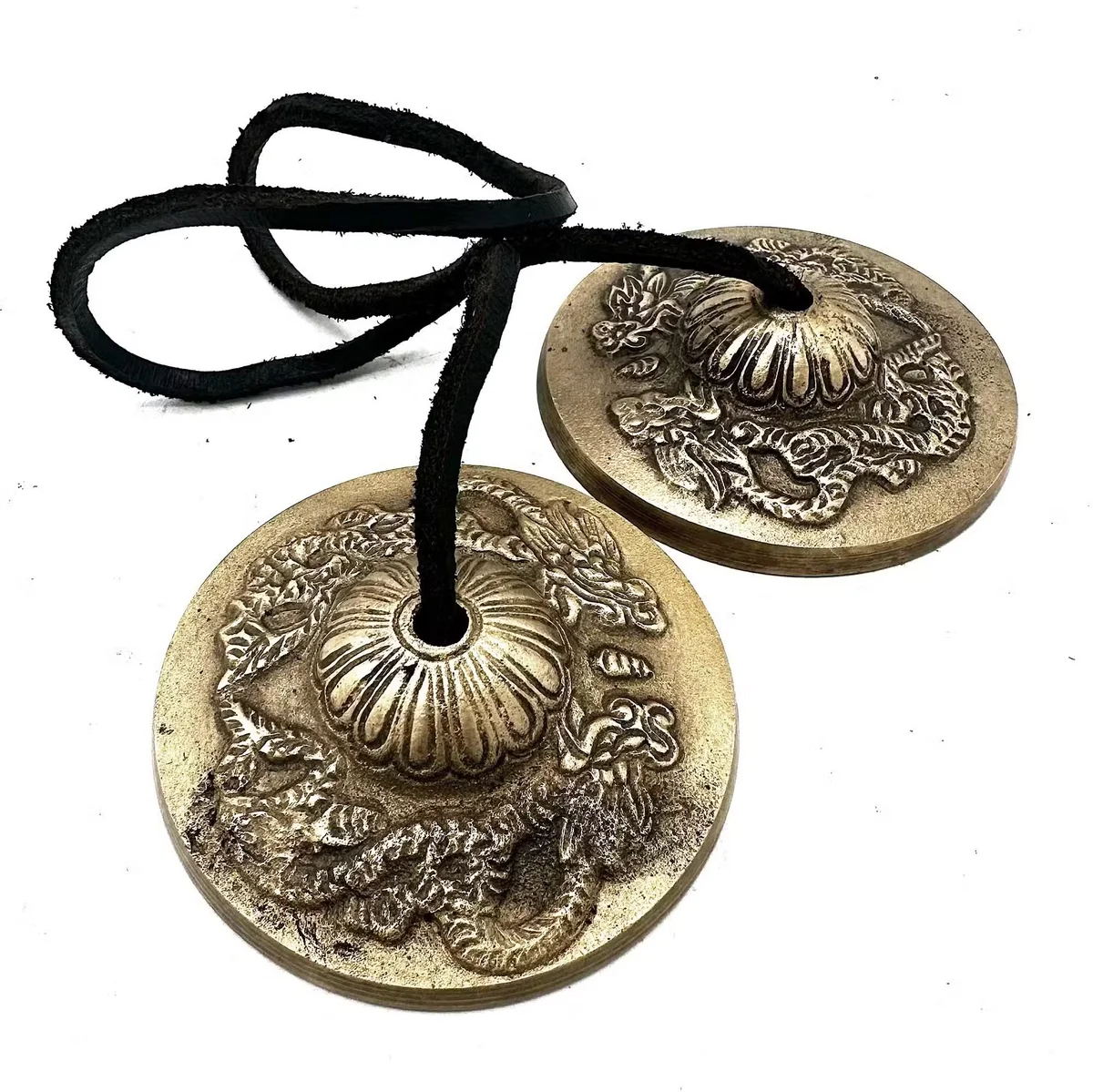 Meditation Tingsha with dragon design, approximately 7.4cm in diameter, used for Tibetan rituals and meditation practices