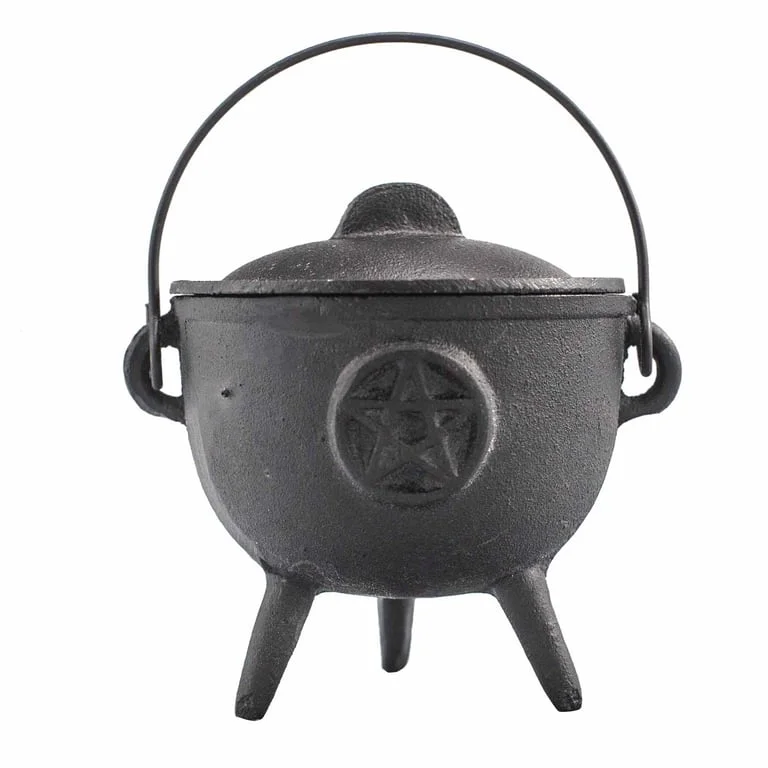 Cast iron cauldron with pentagon shape, 11x13 cm, open top displaying interior