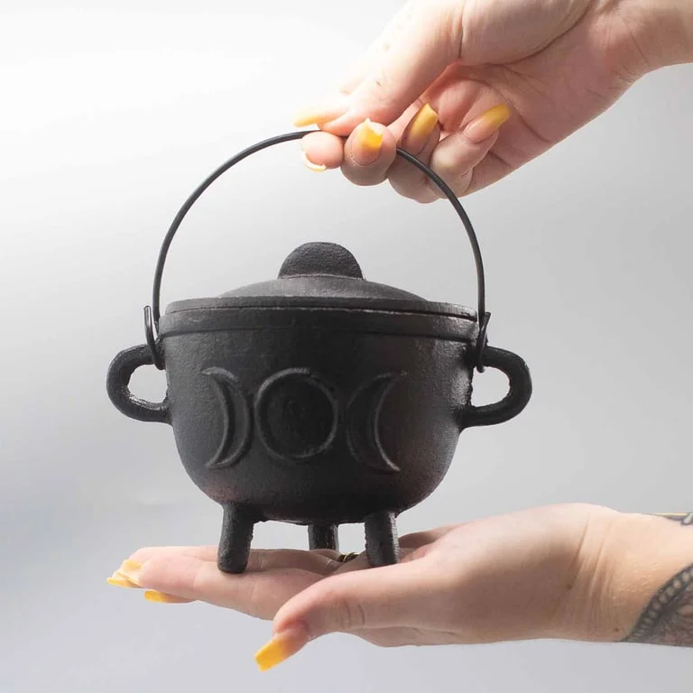 Cast iron figurine of a cauldron with triple moon pattern, 11x13cm