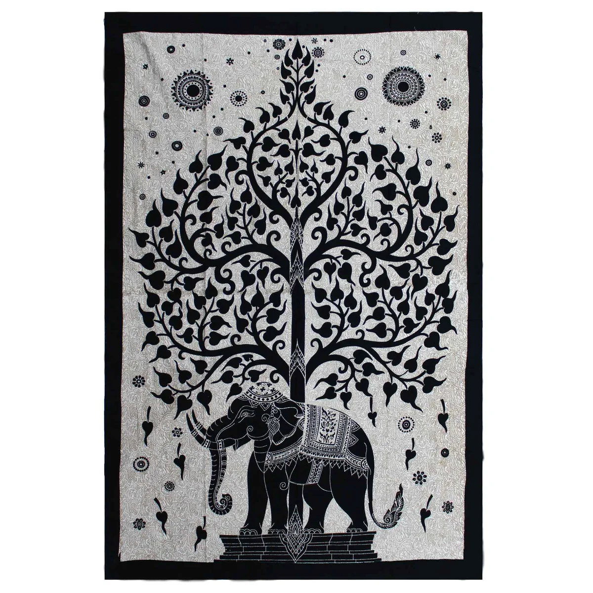 Single cotton elephant tree bedspread in monochrome design displayed as wall hanging in a bedroom setting