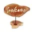 Candle holder sign featuring a welcome message, an attractive piece of welcome sign decor
