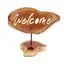 Welcome candle holder sign featuring engraved lettering and a small holder