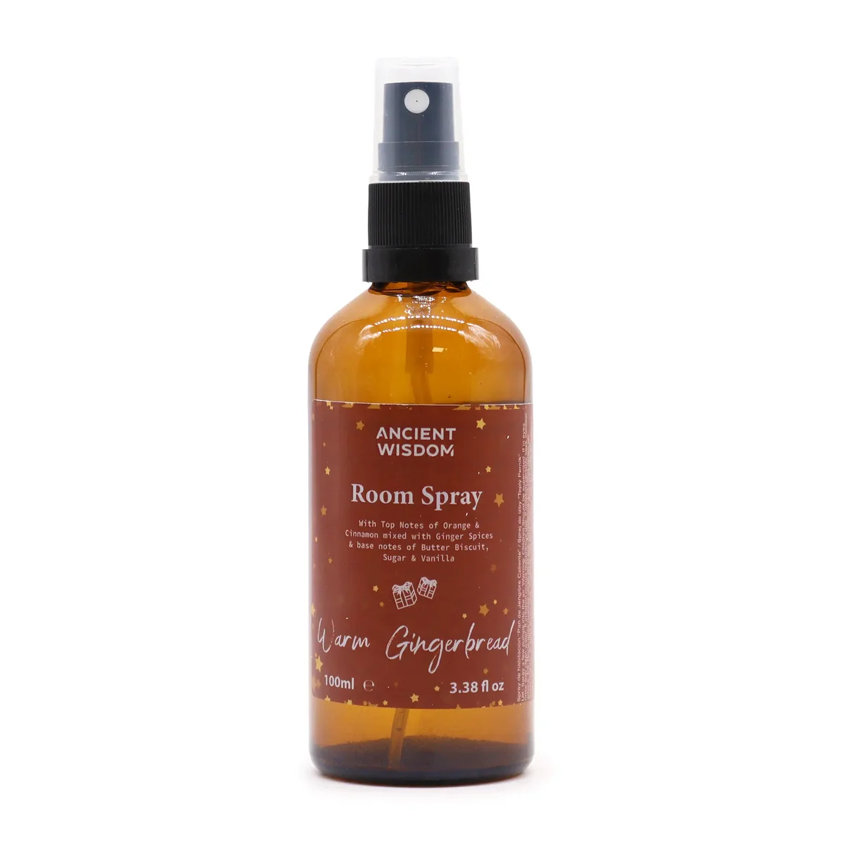 100ml bottle of Warm Gingerbread Room Spray with festive label and spray nozzle on white background