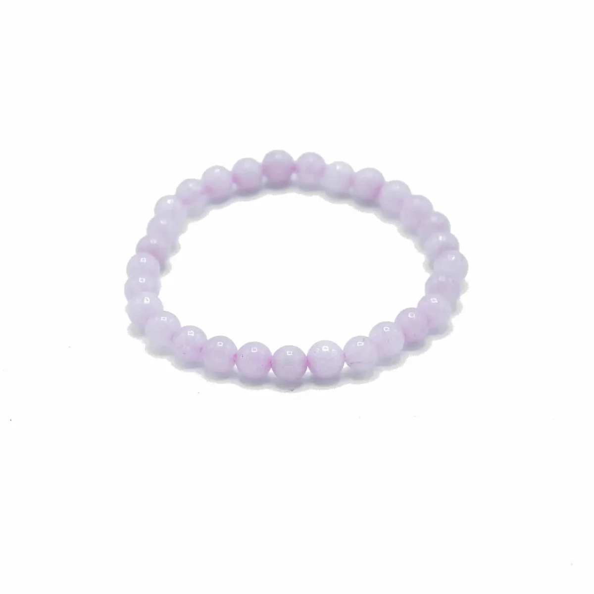 gemstone manifestation bracelet featuring rose quartz beads on a delicate chain