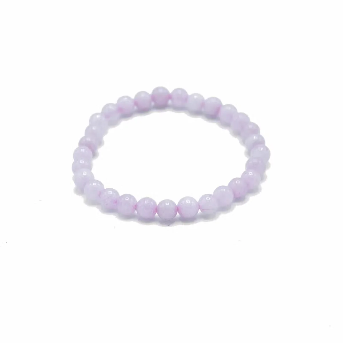 Rose quartz jewellery bracelet worn on wrist, featuring pink crystals set into a delicate chain.