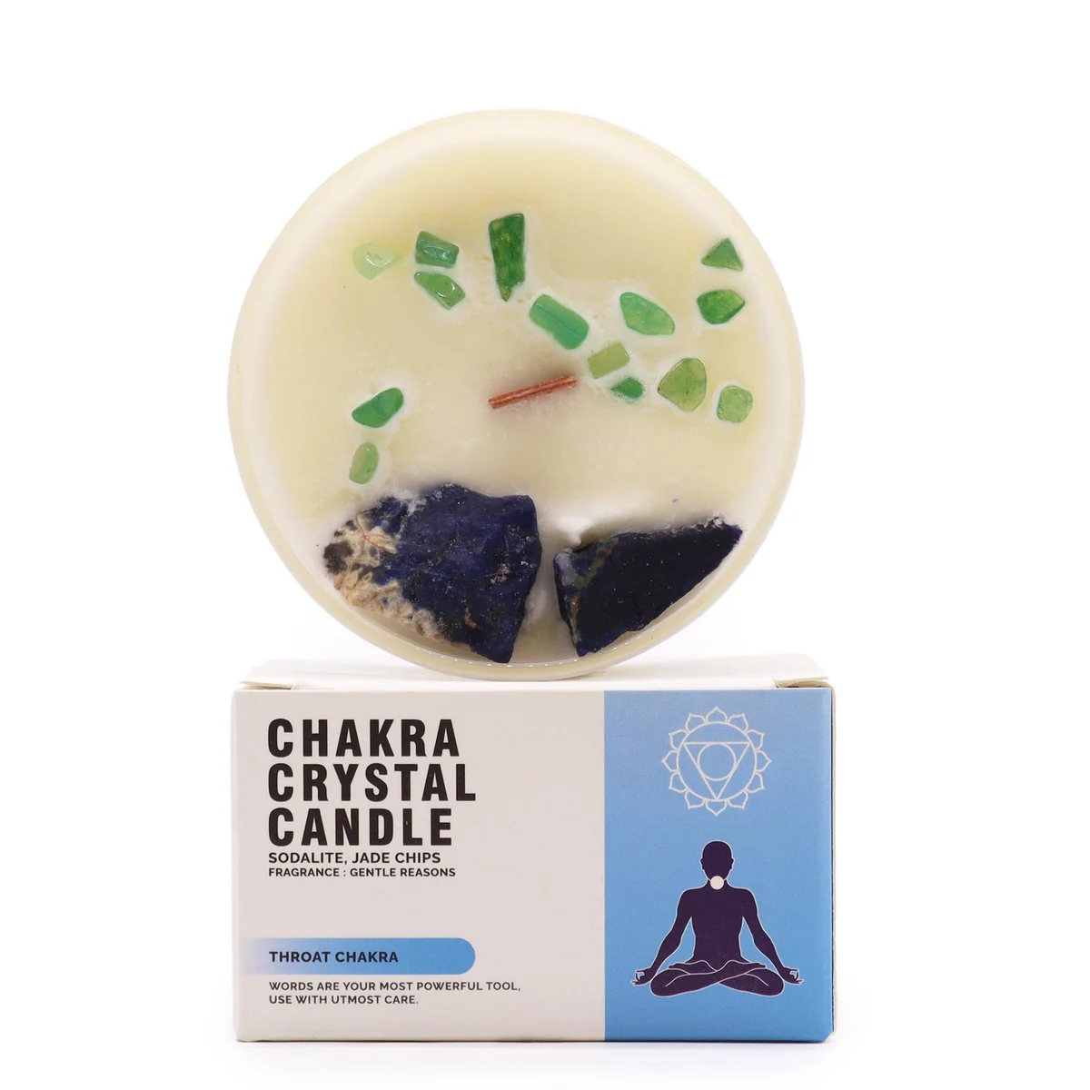 Blue Chakra Crystal Candle for Throat Chakra with healing chakra candle label on wooden surface