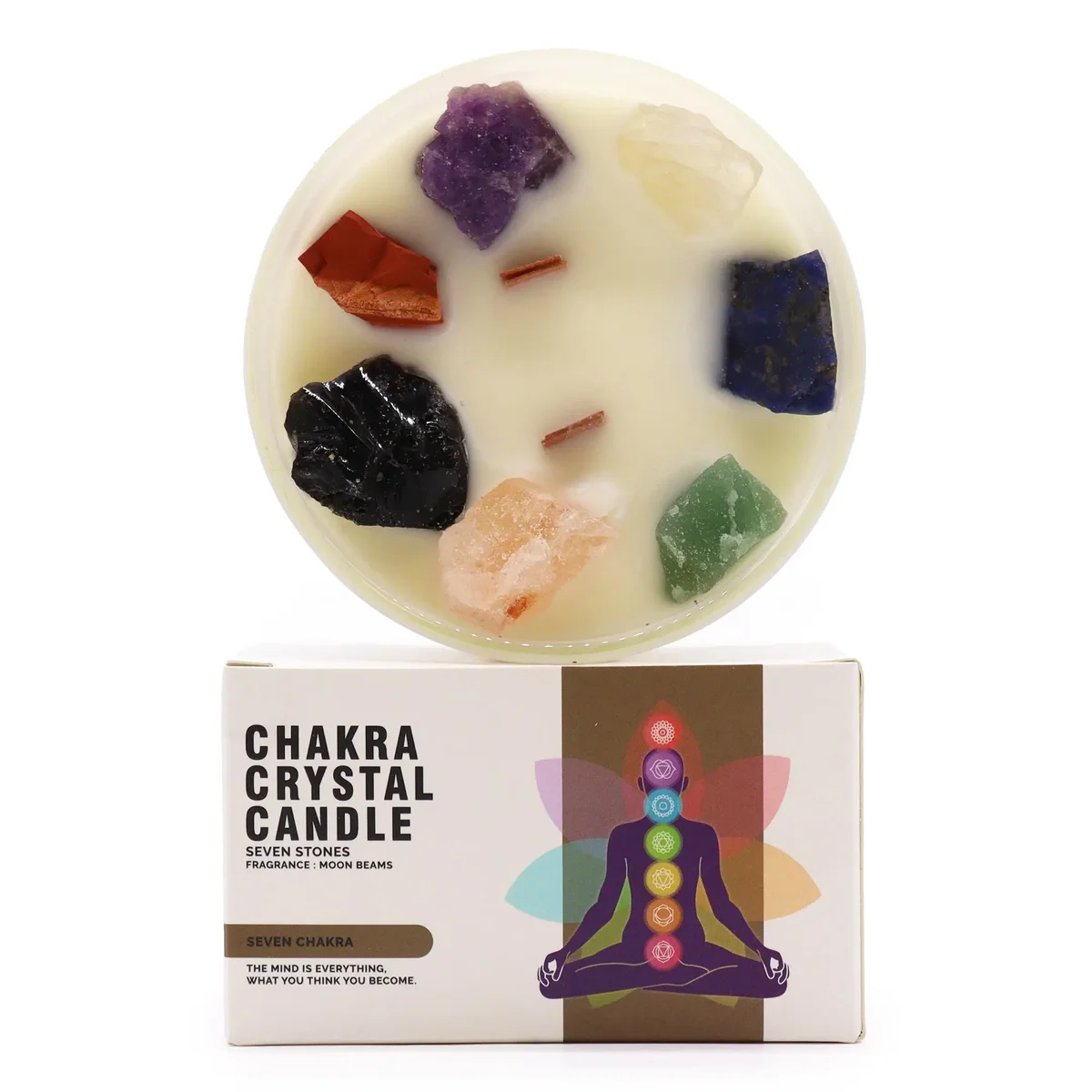 Set of large seven chakra candles with colorful crystals representing each chakra energy point