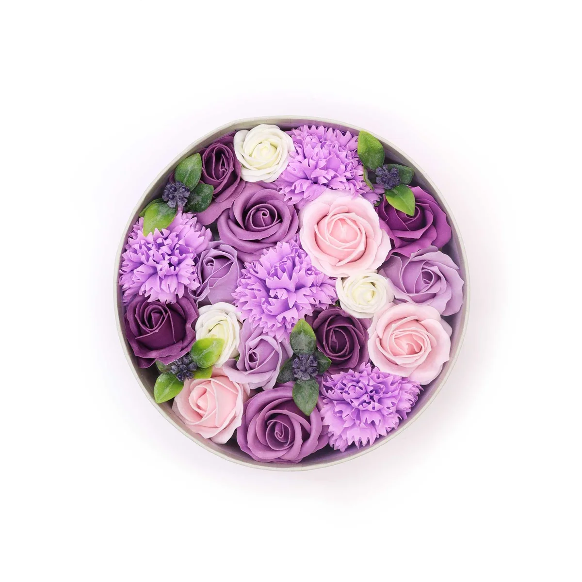 Lavender rose round box with subtle carnation accents, presented as a stylish gift
