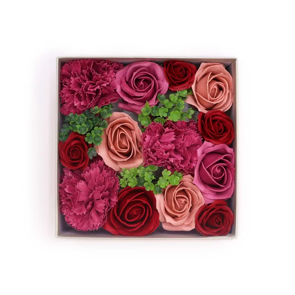 Square vintage decorative box featuring rose motifs.