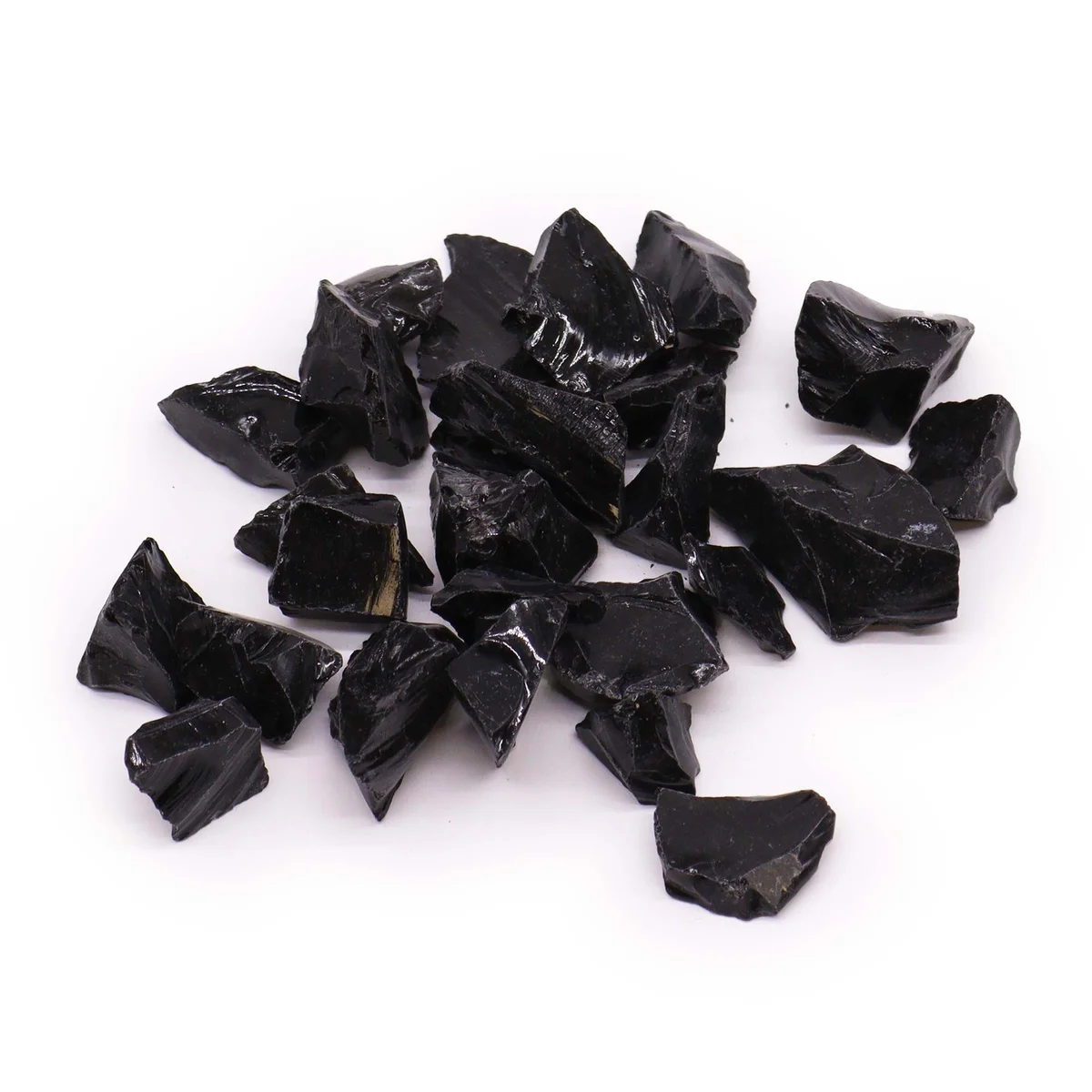 Chunk of black agate raw crystals weighing 500 grams with rough, natural texture on white background