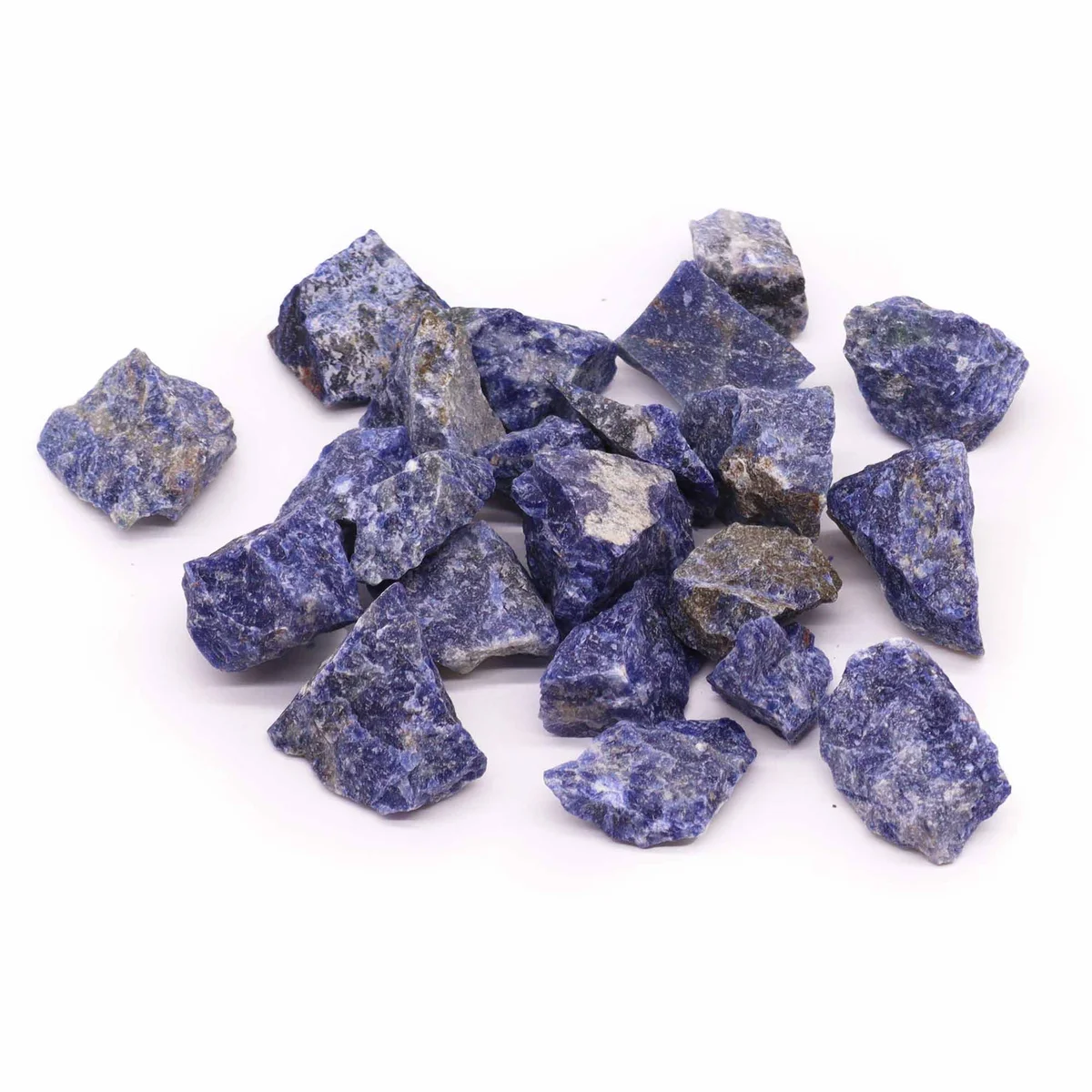 Cluster of deep blue sodalite decorative raw crystals weighing 500gm on a white background