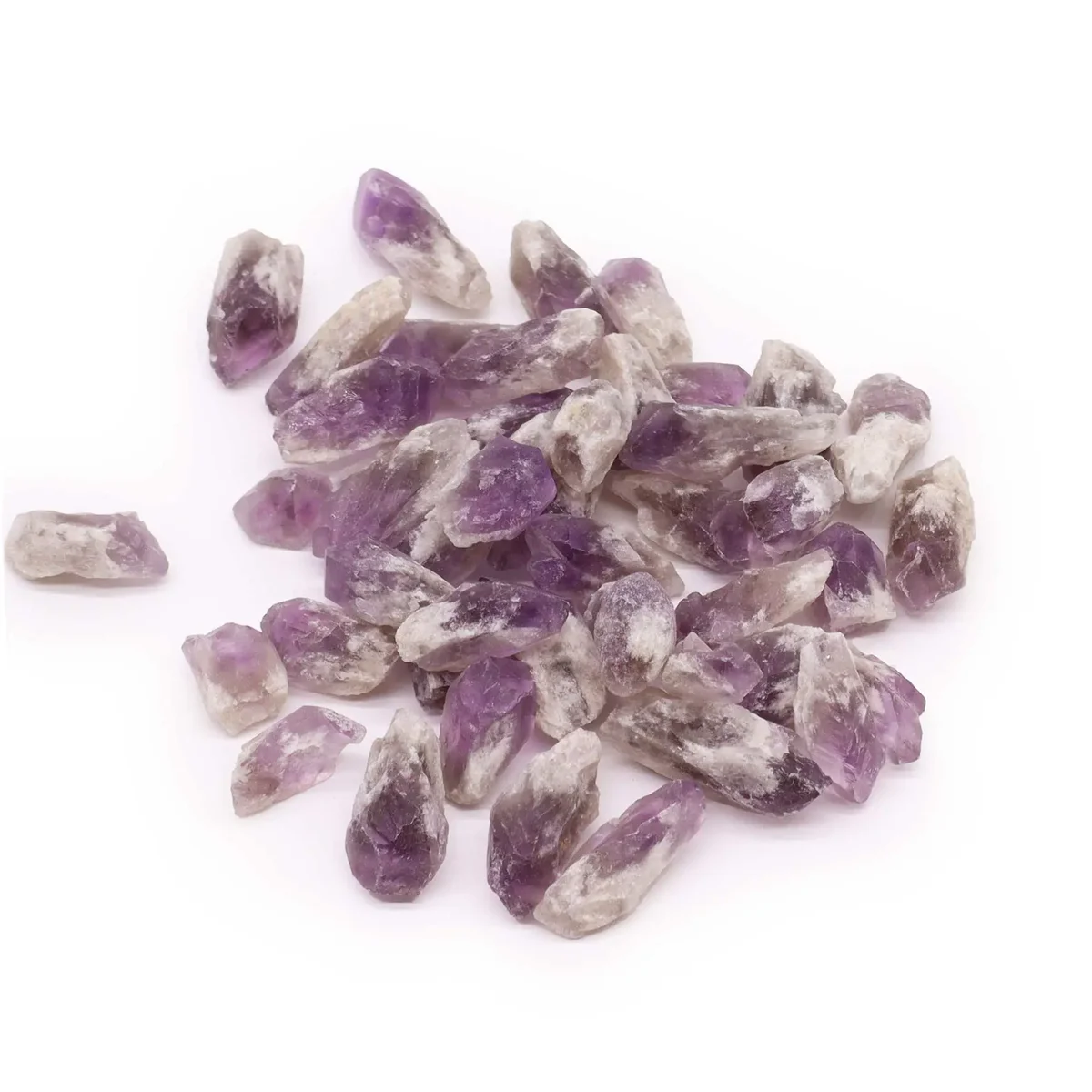 Pile of raw amethyst crystals weighing 500 grams with rough purple points on a white background