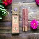 Ritual resin stick, rose coloured, displayed upright on a neutral background