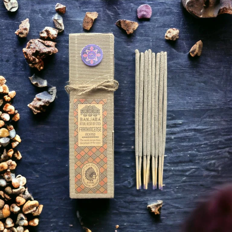 Brown ritual frankincense resin stick on a wooden surface