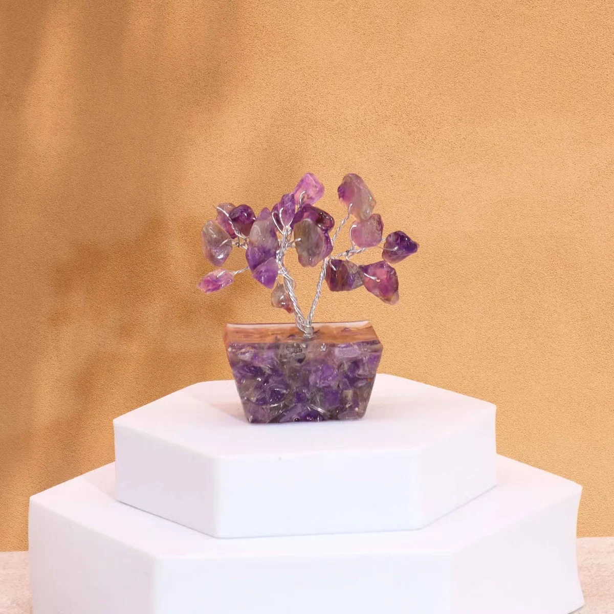 Small crystal tree with 15 amethyst stones on a white orgonite base, decorative and compact gemstone tree display