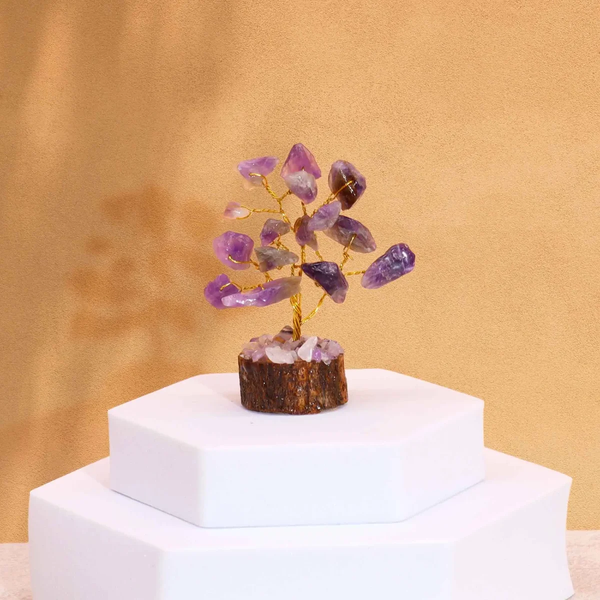 Mini amethyst gemstone tree with 15 stones on a natural wood base for decorative display