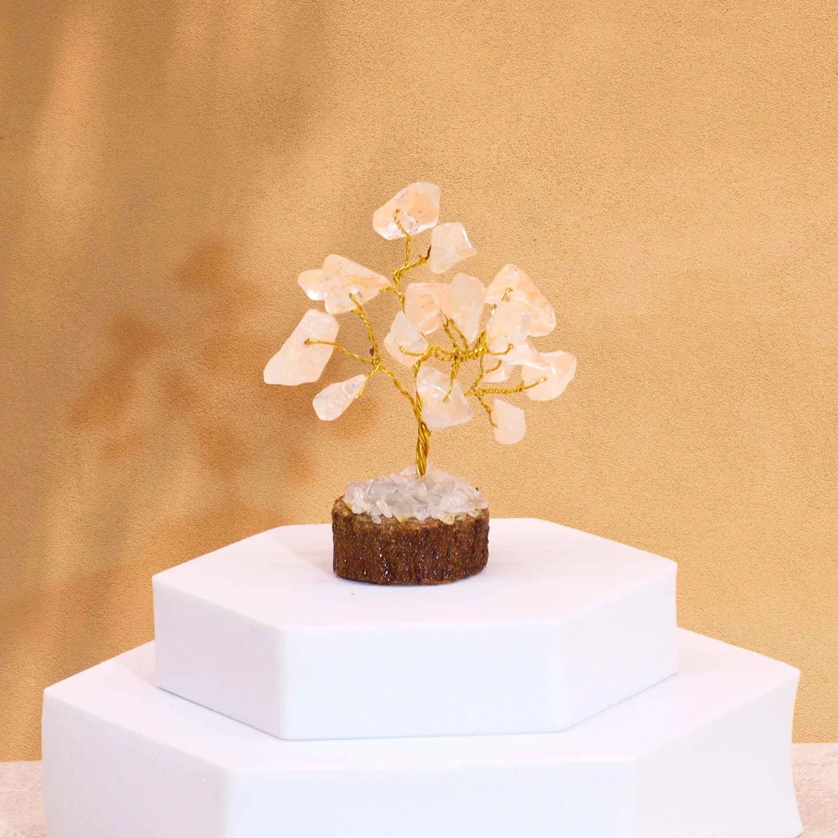 Mini gemstone tree with 15 rock quartz stones on a wooden base displayed on a white background