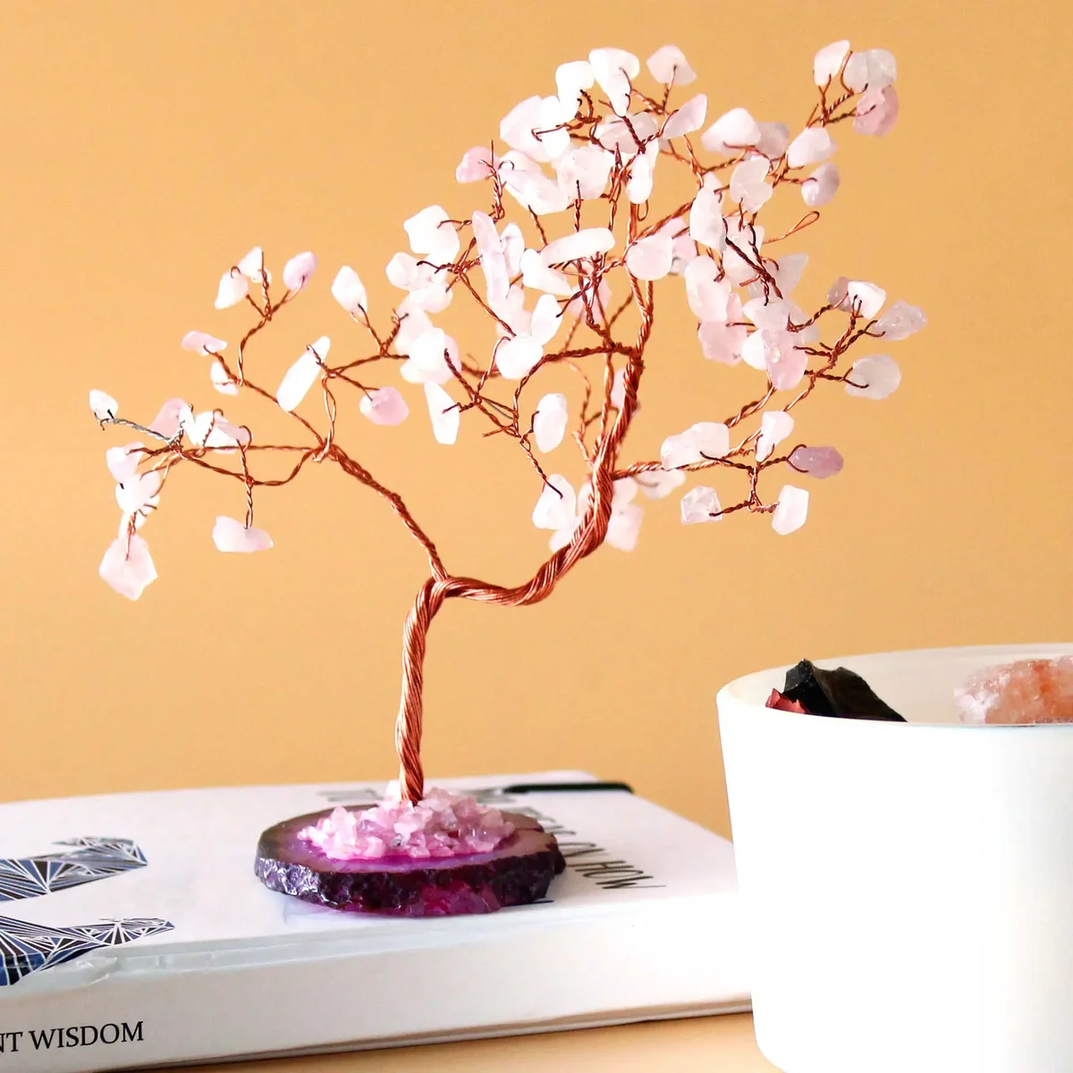 Large gemstone tree with rose quartz leaves on a pink agate base ornament featuring 100 stones