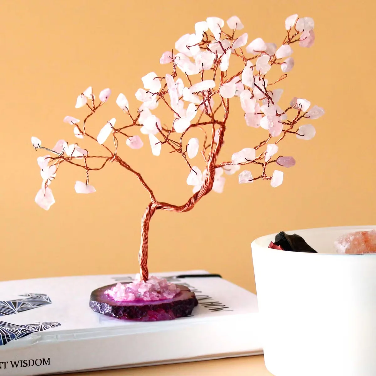 Large crystal gemstone tree with rose quartz stones on a pink agate base featuring 100 stones
