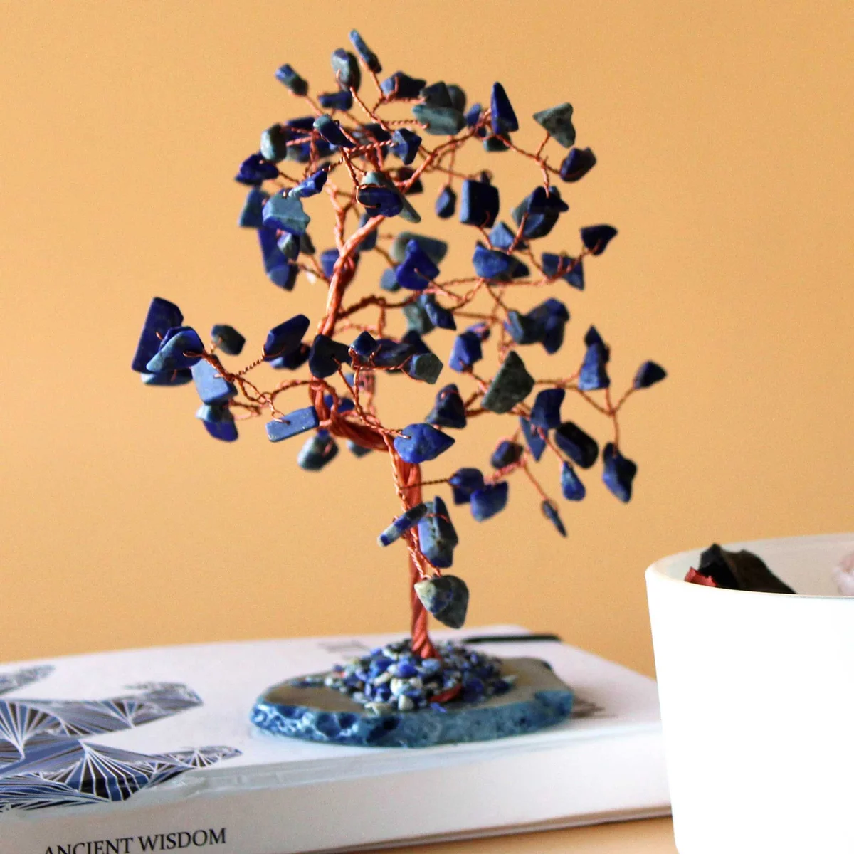 Large gemstone tree with sodalite stones on a polished blue agate base featuring 100 stones