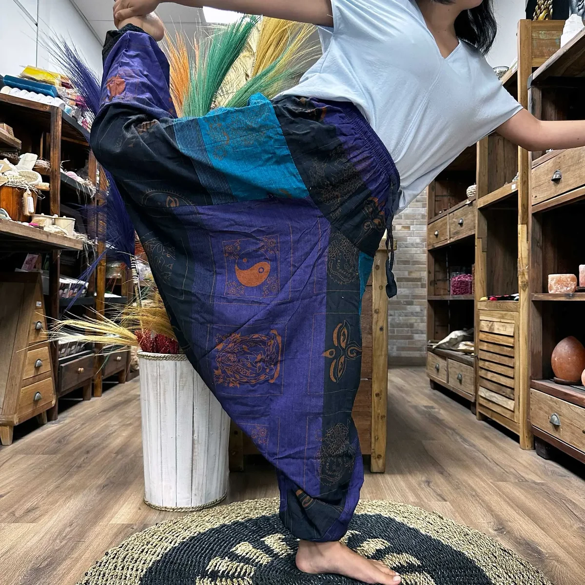 Purple yoga and festival pants featuring Aladdin print with Himalayan design for comfortable wear
