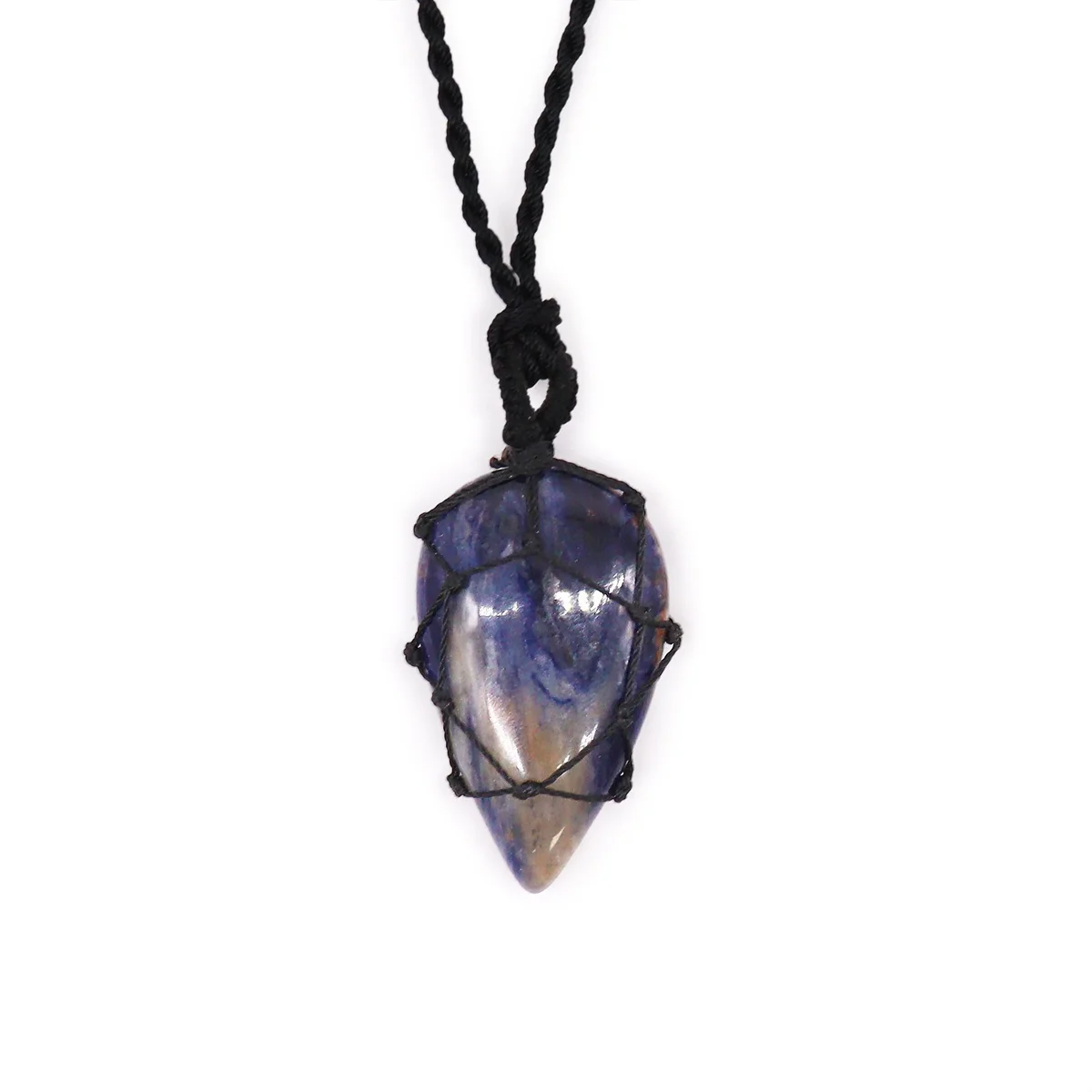 Laced teardrop sodalite pendant necklace with blue gemstone on a delicate silver chain against white background